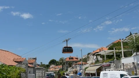 Cable car going up a mountain Stock Footage 112742694
