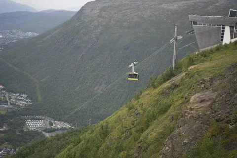 Cable car going up a mountain Stock Photos