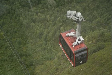 Cable car going up a mountain Stock Photos