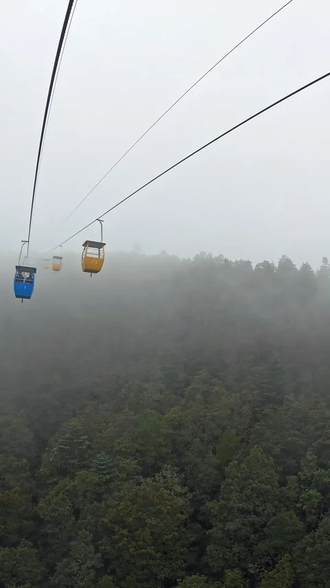 Cable Car Gondolas Ascending Through Fog, Jade Dragon Snow Mountain, Lijiang Stock Footage 341341113