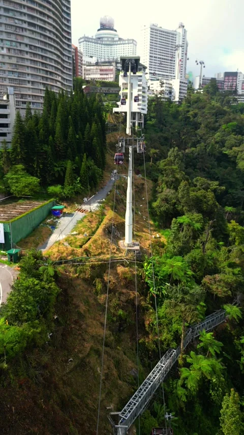 Cable car line crossing forested valley in Genting Highlands Malaysia Stock Footage 324782505