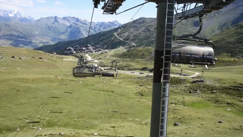 Cable car in motion Alpine view near Arcs 2000 ski station in Savoie, France. Stock Footage 248452236