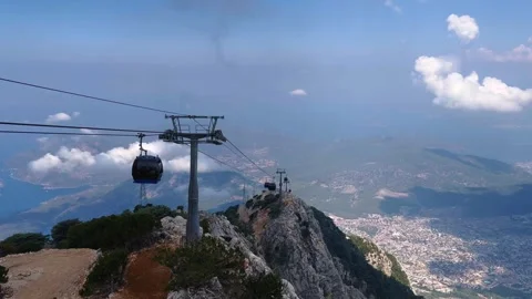 Cable car on Mount Babadag. View from the mountain to the blue lagoon. Stock Footage 283227550