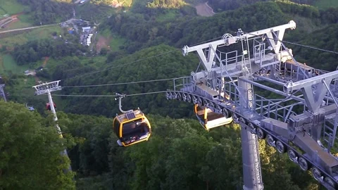 A cable car moving on a mountain Stock Footage 249464250