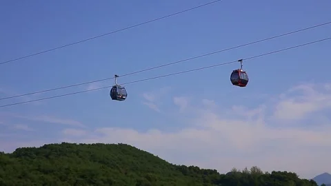 A cable car moving on a mountain Stock Footage 249464431