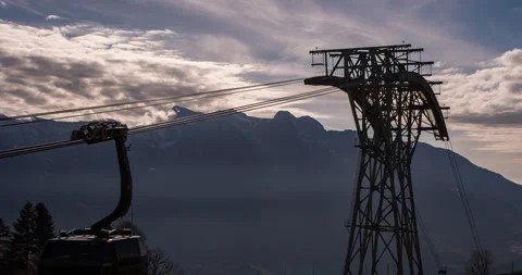 The cable car moving in the mountains. Summer evening outside Stock Footage 130912995