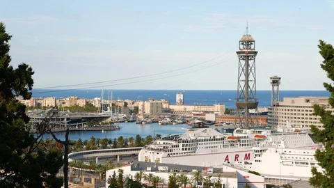 Cable car moving over cruise liner and Port Vell old harbour, Aerial Tramway Stock Footage 102602889