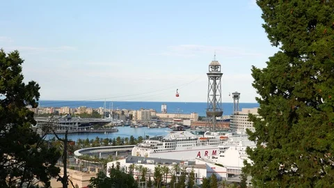 Cable car moving over Port Vell old harbour, Aerial Tramway, Barcelona Stock Footage 102494918
