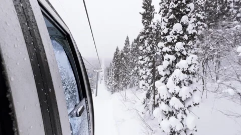Cable car moving over snowy mountains Stock Footage 237239932
