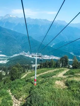 Cable car over Rosa Khutor mountain resort, Russia 库存照片
