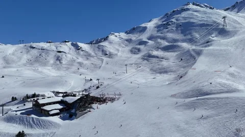 Cable car over slopes of Courchevel ski resort, carrying skiers to Sailure Stock Footage 334211487
