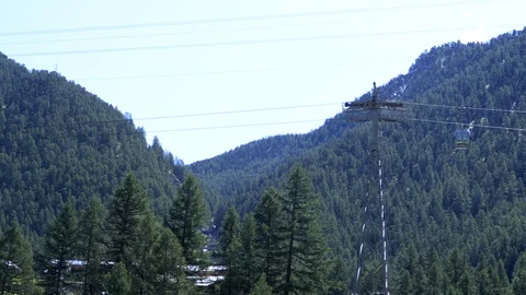 A cable car passes through the swiss alps Stock Footage 114823331