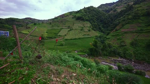 Cable Car Passing Over Scenic Rice Terraces in Mu Cang Chai Stock Footage 345544884