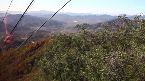 Cable car ride down mountain, China Stock Footage 53220742