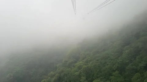 Cable Car Ride to the Mountain Peak, Crossing Dense Fog, so Mystical 스톡 동영상 342536286