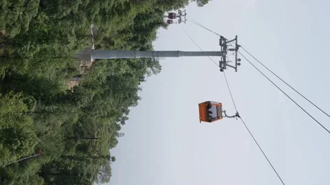 Cable car ride at mountains. Vertical video Stock Footage 224461855