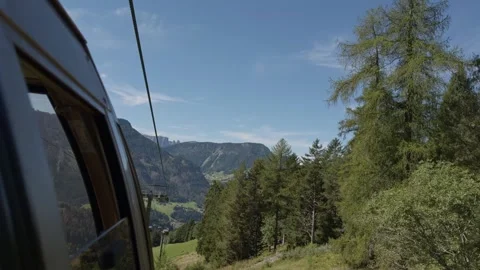 Cable car ride to Seceda mountain in the Dolomites, Italy Stock Footage 320561602
