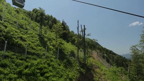 The cable car rises to the mountains Stock Footage 74416391