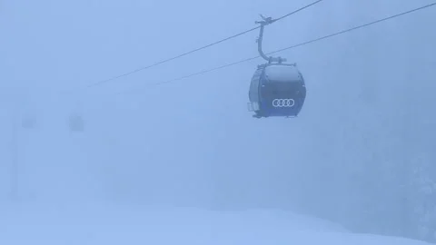 Cable car in snowstorm Stock Footage 123700577