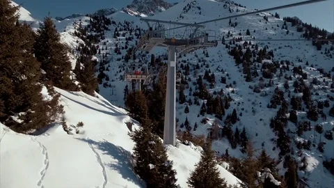 Cable car in snowy mountains Stock Footage 72163736