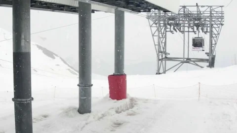 Cable car station on top of the mountain covered with snow, which come Stock Footage 71010408