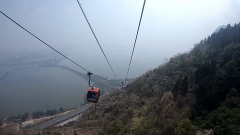 Cable car the way go to The Dragon Gate, Xishan Forest Park, Kunming Stock Footage 104933037