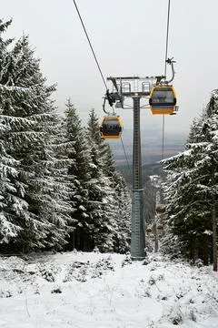 Cable carts in a coniferous forest during winter in the Karkonosze Mountains Stock Photos