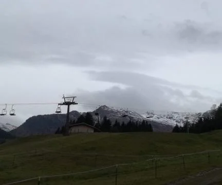 CABLE-CHAIR  up+down the mountain Stock Photos