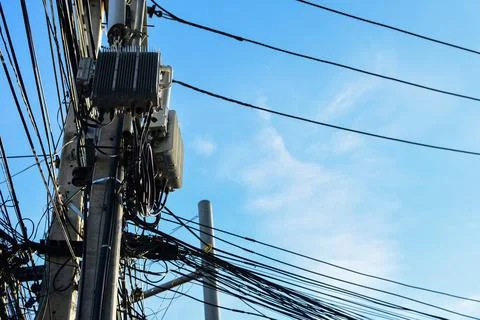 Cable clutter located on power poles Stock Photos