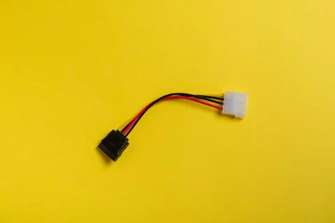 Cable for computer and laptop on a yellow background Stock Photos