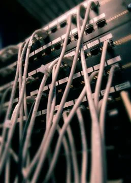 CABLE CONNECTIONS ON LARGE COMPUTER NETWORK Stock Photos