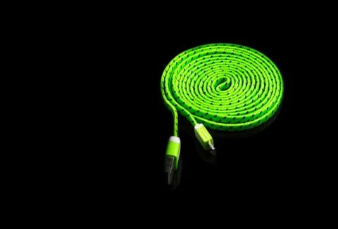 Cable connector micro-USB to USB on isolated black background Foto stock