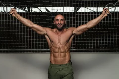 Cable crossover chest workout Stock Photos