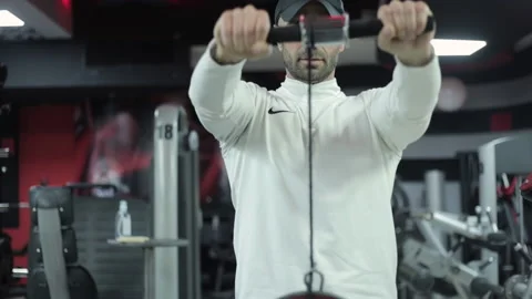Cable Curl workout in gym 스톡 동영상 145561951