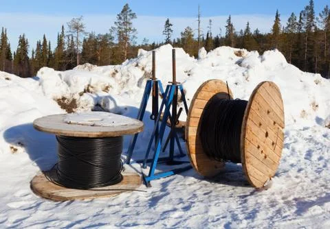 Cable drums in the snow Stock Photos
