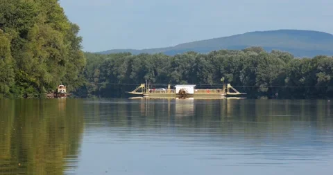 Cable ferry for cars on a river Stock Footage 178635510