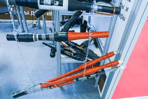 Cable joint samples displayed at an industrial exhibition. High voltage power Stock Photos