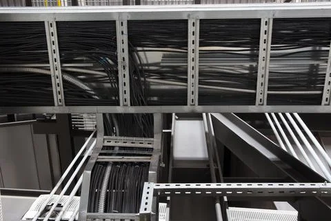 Cable ladder installation through opening of the wall Stock Photos