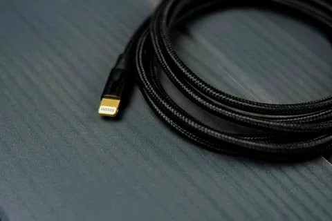 Cable with ligthning type terminal for connection with electronic devices Stock Photos