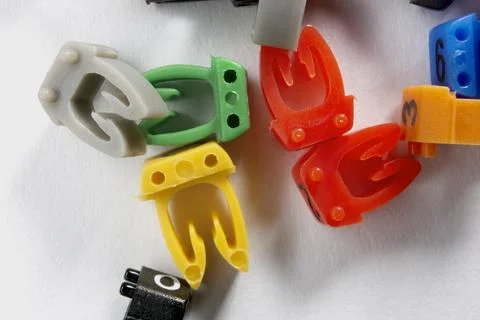Cable marker number on a white background, close-up plastic elements for mark Stock Photos