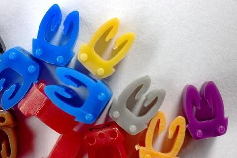 Cable marker number on a white background, close-up plastic elements for mark Stock Photos