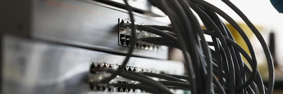 Cable network connected to internet switch servers in data center Stock Photos