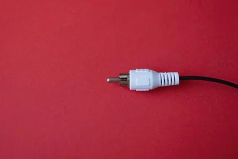 Cable plug connection on a red background Stock Photos