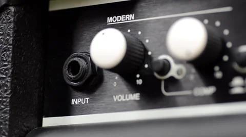 Cable Plugging Into a Guitar Amp Stock Footage 49600775