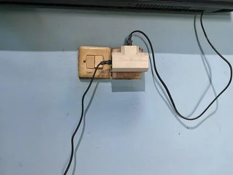 Cable power electricity on the wall with switch on and off power Stock Photos