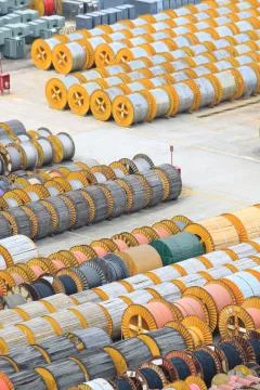 Cable roll and transformer on the floor Stock Photos