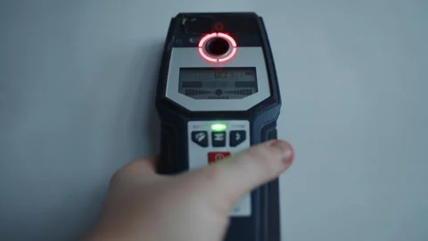 Cable scanning with wall detector Video stock 313799734