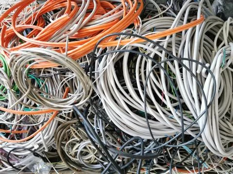 Cable scrap collected in a box for melting down and recycling Stock Photos
