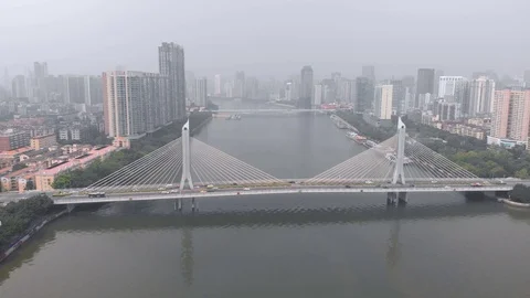 Cable-stayed bridge across the river. Guangzhou China Stock Footage 117884742