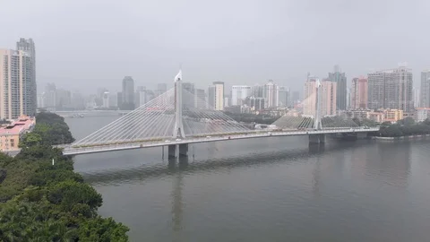 Cable-stayed bridge across the river. Guangzhou China Stock Footage 117884906